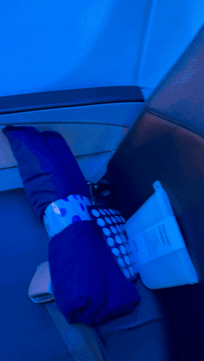 Blue Pillow With White Polka Dots On Blue Chair GIF