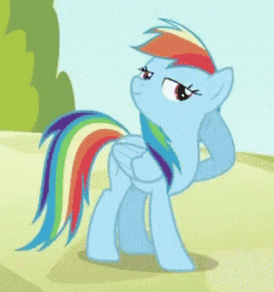 Blue Pony With Rainbow Tail Standing On Dirt Road GIF