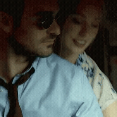 Blue Shirt Man Hugs Woman In White Shirt GIF