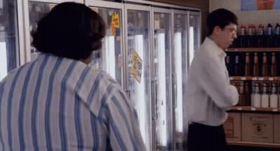 Blue Shirt Man I'm Jealous Brick Wall GIF