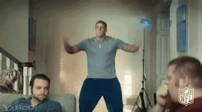 Blue Shirt Man Jumping In Front Of Men GIF