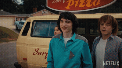 Blue Shirt Man Next To Netflix Shirt Man GIF