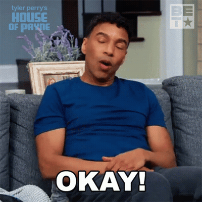 Blue Shirt Man On Couch Says Okay GIF