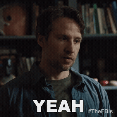 Blue Shirt Man Saying Yeah Bookshelf GIF