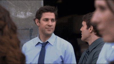 Blue Shirt Man With Tie Talking To Green Shirt Man GIF