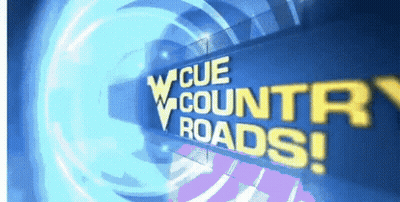 Blue Sign Saying Cue Country Roads GIF