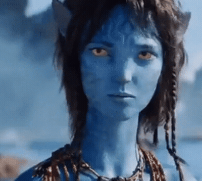 Blue Skin Woman With Yellow Eyes And Necklace GIF