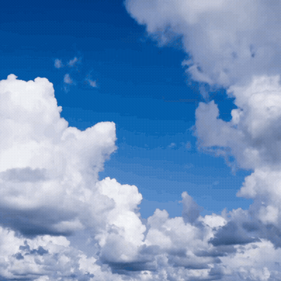 Blue Sky With White And Dark Clouds GIF