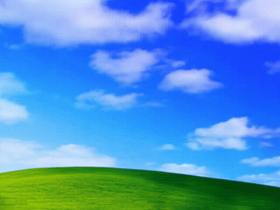 Blue Sky With White Clouds Over Green Hill GIF