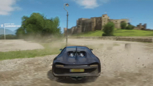Blue Sports Car Driving Down Dirt Road With Banburgh Cast Sign GIF