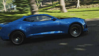 Blue Sports Car Driving Down Road GIF