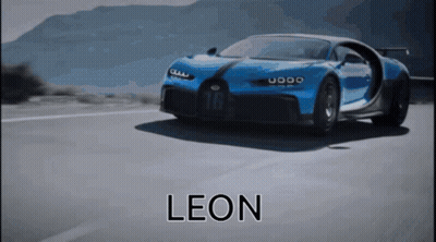Blue Sports Car Driving Down Road With Leon GIF