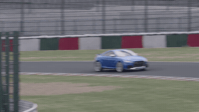 Blue Sports Car On Race Track GIF