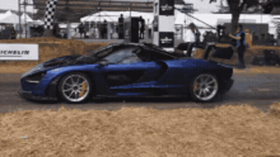 Blue Sports Car With License Plate P14 00V GIF
