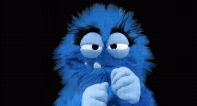Blue Stuffed Animal Covering Mouth GIF