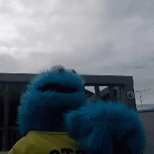 Blue Stuffed Animal In Yellow Shirt Saying Off GIF