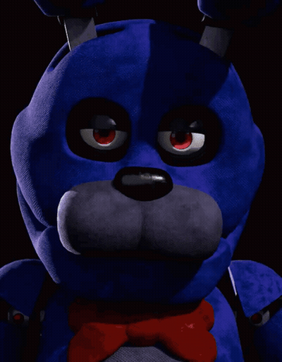 Blue Stuffed Animal With Red Eyes And Pink Tongue GIF