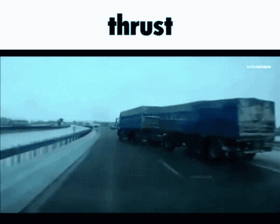 Blue Truck Driving Down Highway With Thrust GIF
