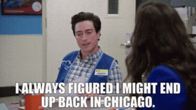 Blue Vest Man Talking To Blue Jacket Woman GIF