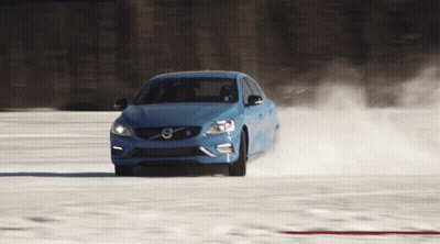 Blue Volvo Car In Snowy Field GIF