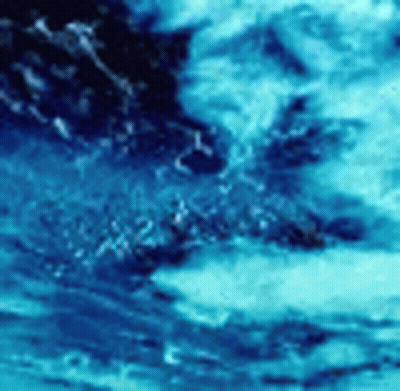 Blue Water Surface With Waves and Bubbles