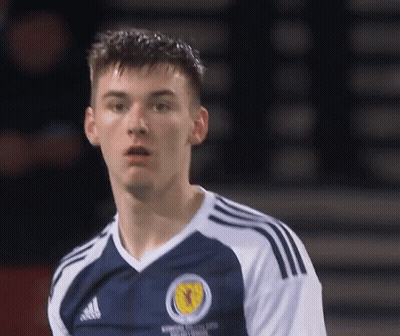 Blue White Adidas Jersey Man Looking At Camera GIF