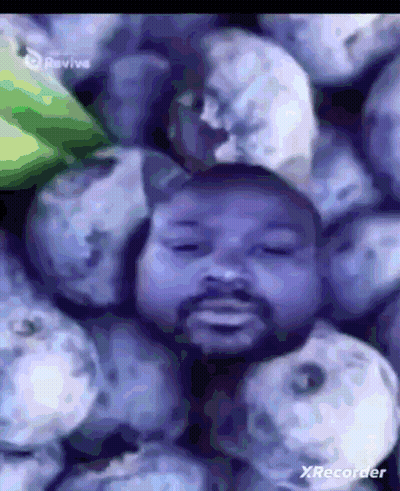 Blueberries With Man's Face GIF