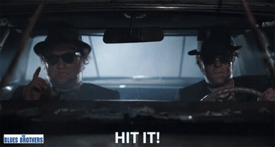 Blues Brothers Poster Two Men In Car Saying Hit It GIF
