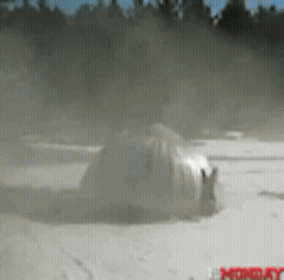 Blurred Car In Snow Saying Monday GIF