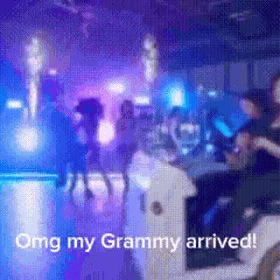 Blurred Crowd Omg My Grammy Arrived GIF