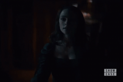 Blurred Dark Room With Show Case GIF