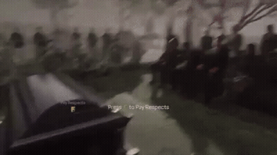 Blurred Group Of People Standing Around Table GIF