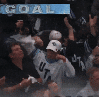 Blurred Group Of People With Goal Behind GIF