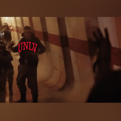 Blurred Group Of People With Only In Red Letters GIF