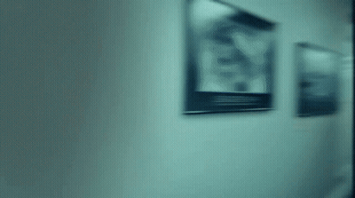 Blurred Hallway With Picture On Wall GIF
