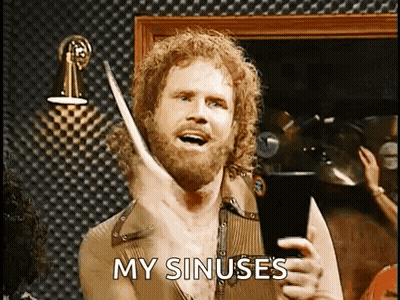 Blurred Man Holding Paper Saying More Cowbell GIF