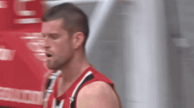 Blurred Man In Red And Black Jersey With Letter L GIF