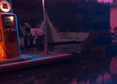 Blurred Man In Red Hat Driving Red Car GIF