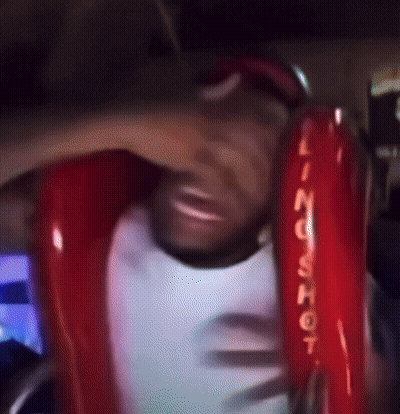 Blurred Man In Red Jacket Saying N GIF