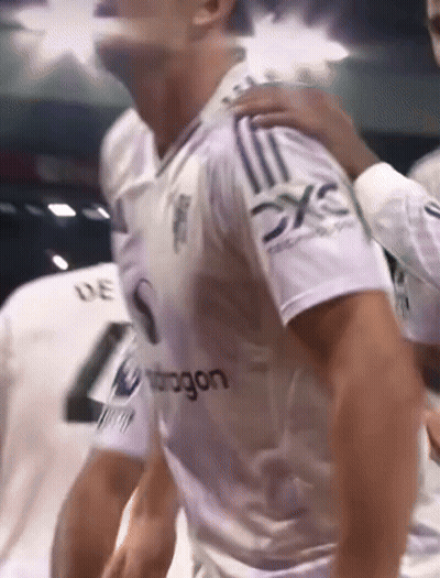 Blurred Man In White Shirt Saying Dragon GIF