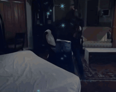 Blurred Person Behind Bars With Purple And Pink Stars GIF