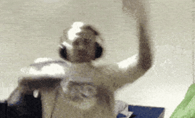 Blurred Person Dancing With Headphones GIF