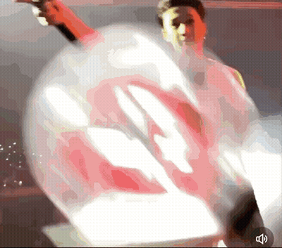 Blurred Person Holding Balloon With Sound Button GIF