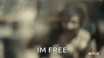 Blurred Person Holding Gun Saying Im Free GIF