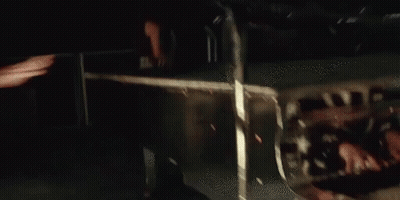 Blurred Person Holding II Flag GIF