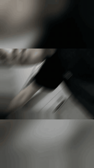 Blurred Person In Black Shirt GIF