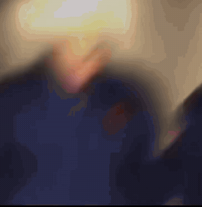 Blurred Person's Face With Yellow Light GIF