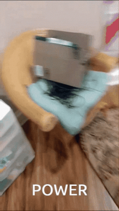 Blurred Person Sitting On Pillow Saying Power GIF