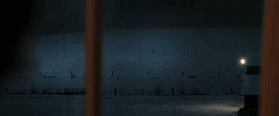 Blurred Person Standing In Dark GIF