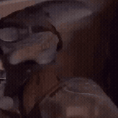 Blurred Person Standing In Front Of Flame GIF